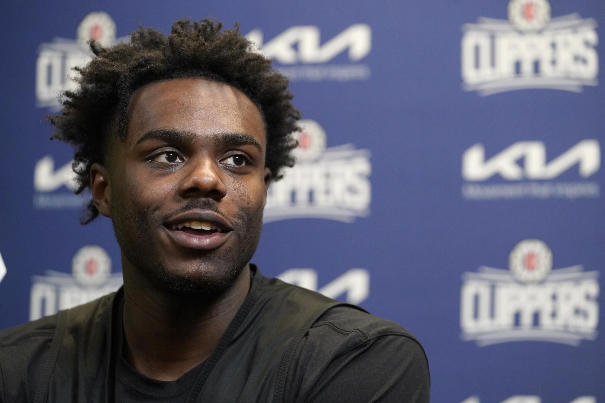 Kobe Brown speaks during a news conference after being selected by the Clippers.