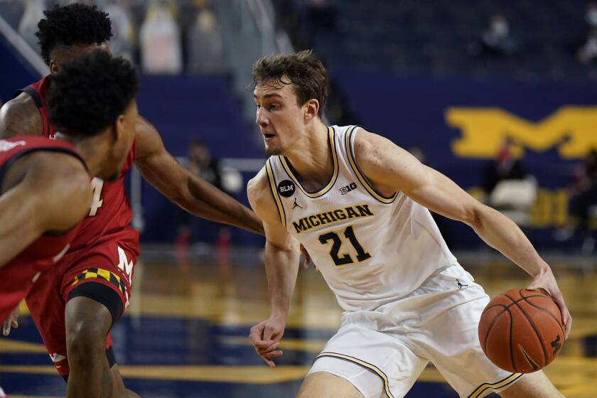 Michigan's Franz Wagner drives during the second half of a game against Maryland on Tuesday