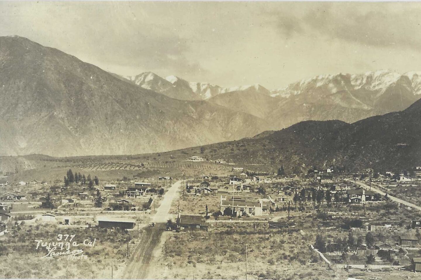 A vintage postcard shows the mountain vistas of Tujunga