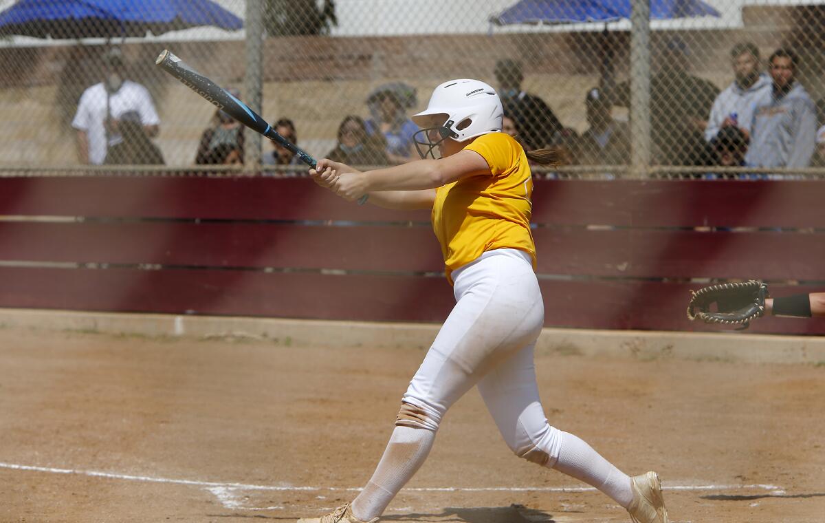 Ocean View's Ashley Capelouto hits a single to drive in a runner during the third inning against Fountain Valley.