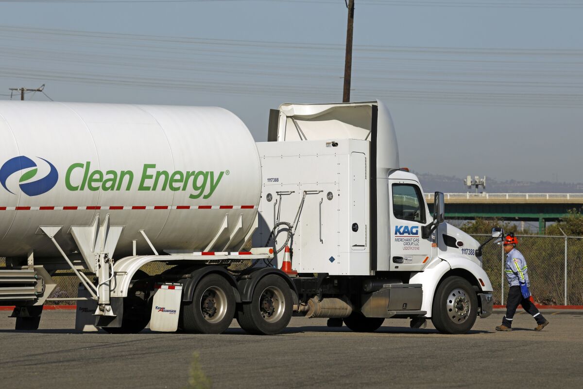 A worker arrives to transfer natural gas from a Clean Energy Fuels tanker truck to a fueling station in Wilmington.