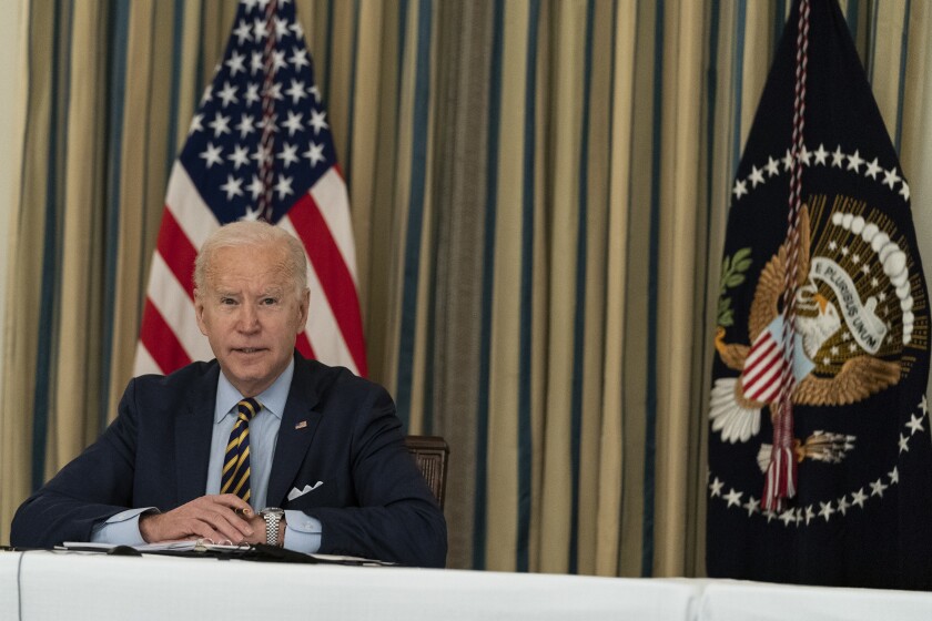 President Joe Biden speaks during a virtual meeting with Indian Prime Minister Narendra Modi, Australian Prime Minister Scott Morrison and Japanese Prime Minister Yoshihide Suga, from the State Dining Room of the White House, Friday, March 12, 2021, in Washington. (AP Photo/Alex Brandon)