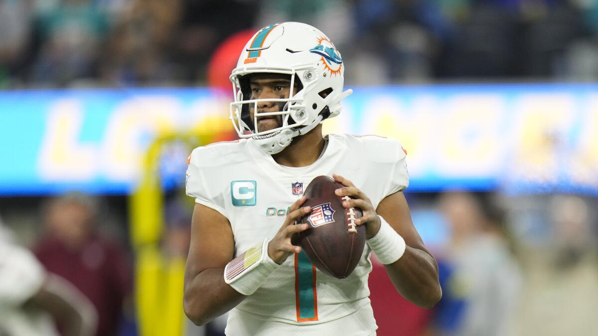 Miami Dolphins quarterback Tua Tagovailoa looks to throw a pass against the Chargers.