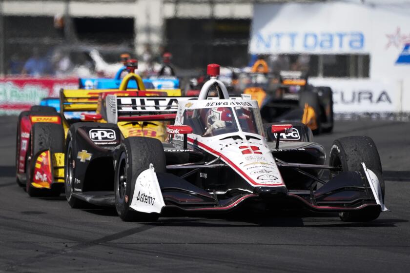 Team Penske driver Josef Newgarden (2) of United States leads the pack during the Grand Prix of Long Beach