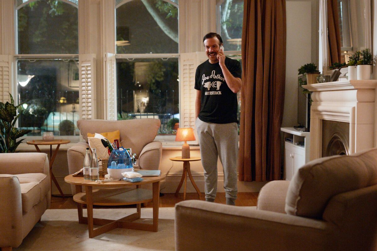 After an eventful, if inhospitable first day in London, Ted (Jason Sudeikis) calls his wife and son back in Kansas. 