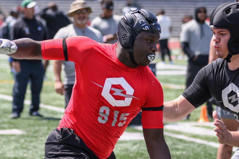 Orange Vista defensive end Dion Wilson Jr. tries to get around the edge against USC offensive lineman commit Caadyn Stephen at the Opening Oakland Regional on May 11, 2019.