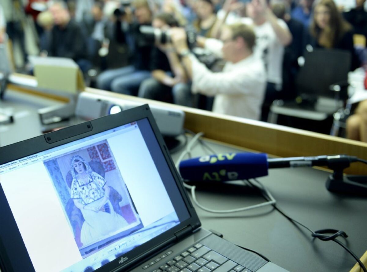 A painting believed to be by Henri Matisse can be seen on a computer screen during a news conference on Nov. 5 in Augsburg, Germany. The piece was recovered from the apartment of art dealer Cornelius Gurlitt, son of a well-known Nazi art dealer.