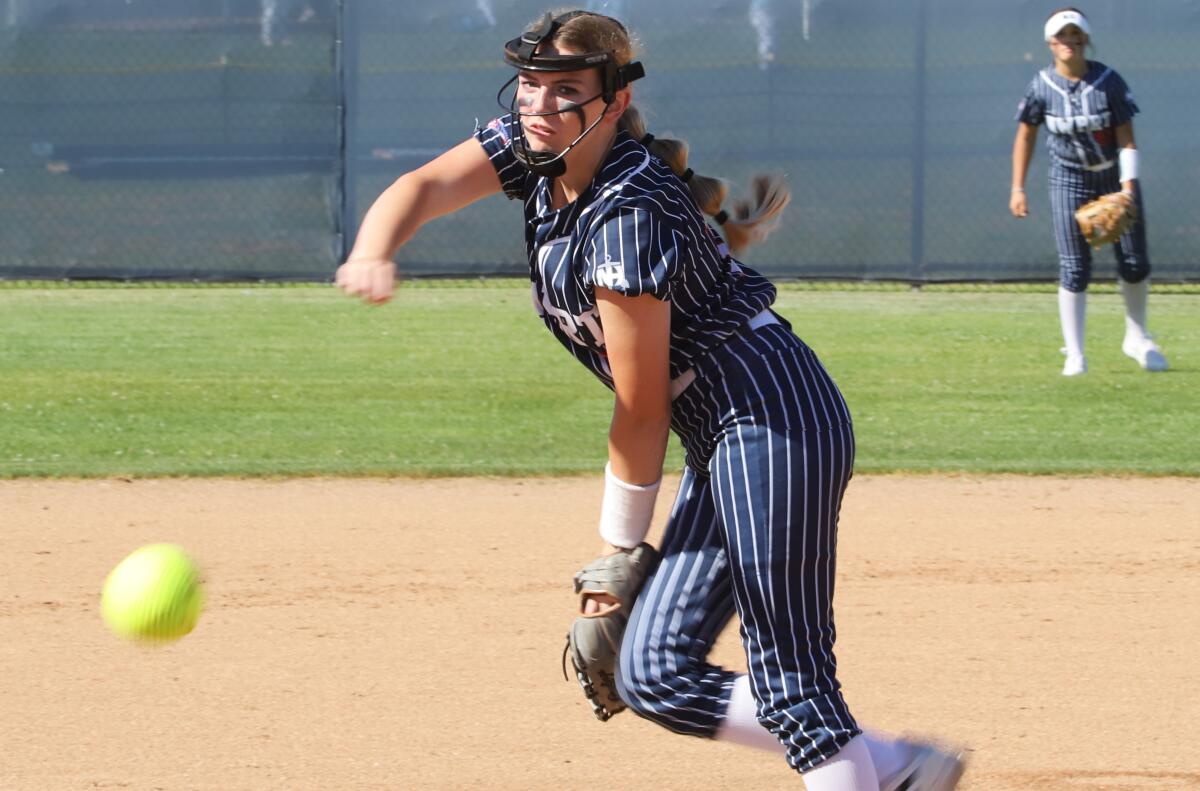 Newport Harbor's Ginny Peterson pitches against Corona del Mar in the Battle of the Bay.