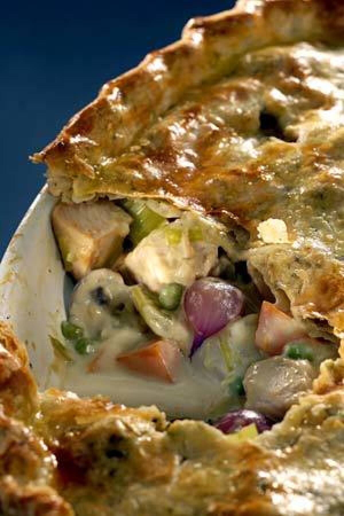 BOUNTY: Pot pie is filled with turkey, pearl onions, mushrooms, potatoes and peas.