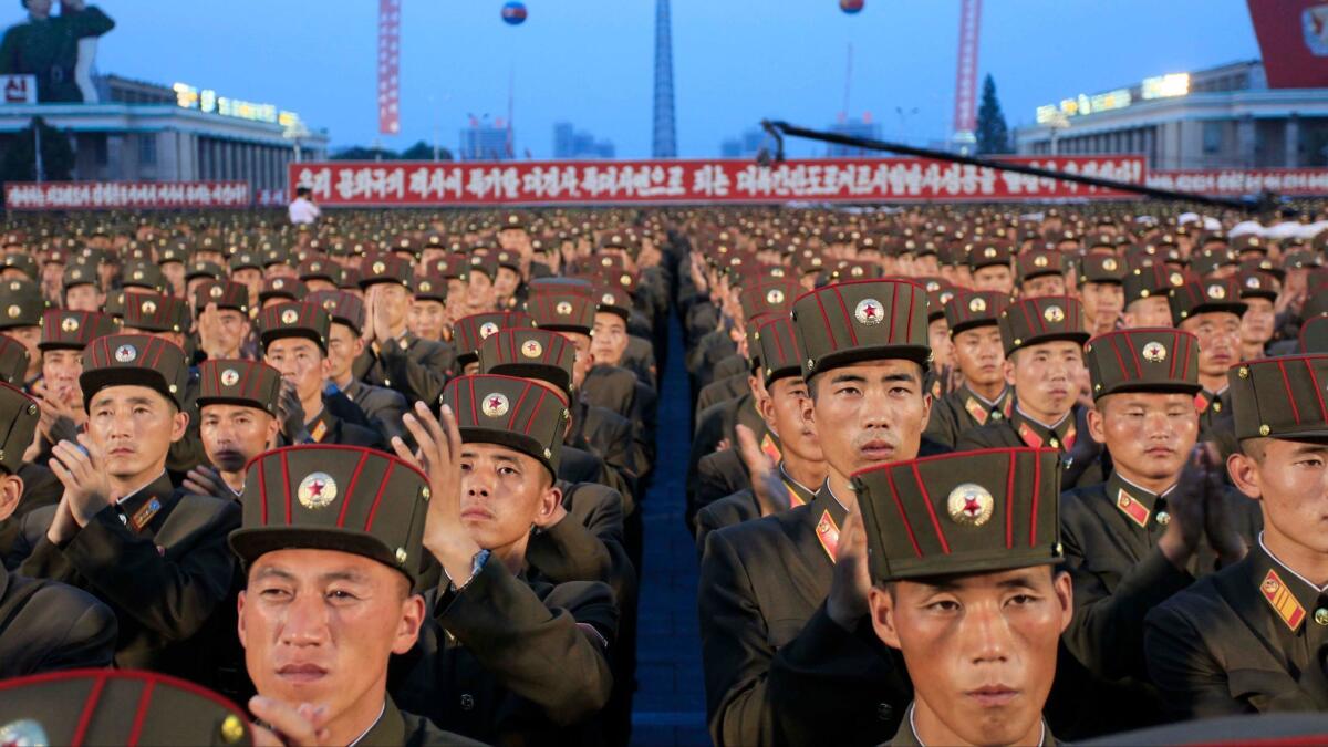 Soldiers gather in Kim Il Sung Square in Pyongyang on July 6 to celebrate the test launch of North Korea's first intercontinental ballistic missile.