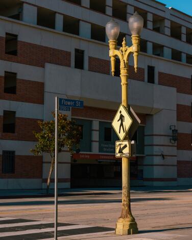 A Southwest 1806 street lamp with double globes in Los Angeles.