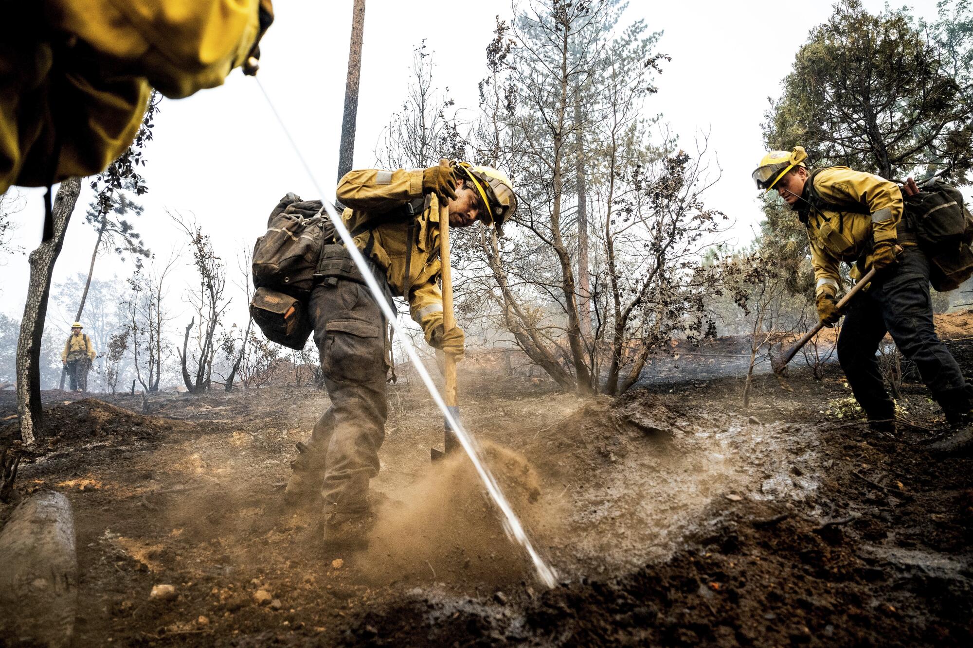 Firefighter Sergio Porras battling the Oak fire in the Jerseydale community of Mariposa County, Calif., on July 25, 2022.