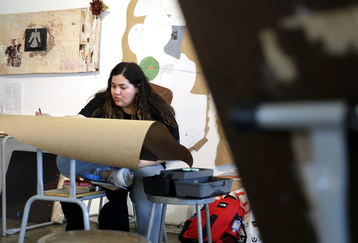 Antonia Sanchez works on an art project in her art class at UCLA