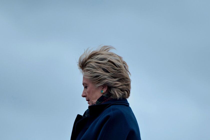 (FILES) This file photo taken on October 14, 2016 shows former Democratic presidential nominee Hillary Clinton arriving at Boeing Field in Seattle, Washington. Clinton promises to explain "what happened" during her last presidential campaign in her new book, set to lauch on September 12, 2017. "What Happened" will reveal what her experience was like during one of the most controversial US elections. / AFP PHOTO / Brendan SmialowskiBRENDAN SMIALOWSKI/AFP/Getty Images ** OUTS - ELSENT, FPG, CM - OUTS * NM, PH, VA if sourced by CT, LA or MoD **