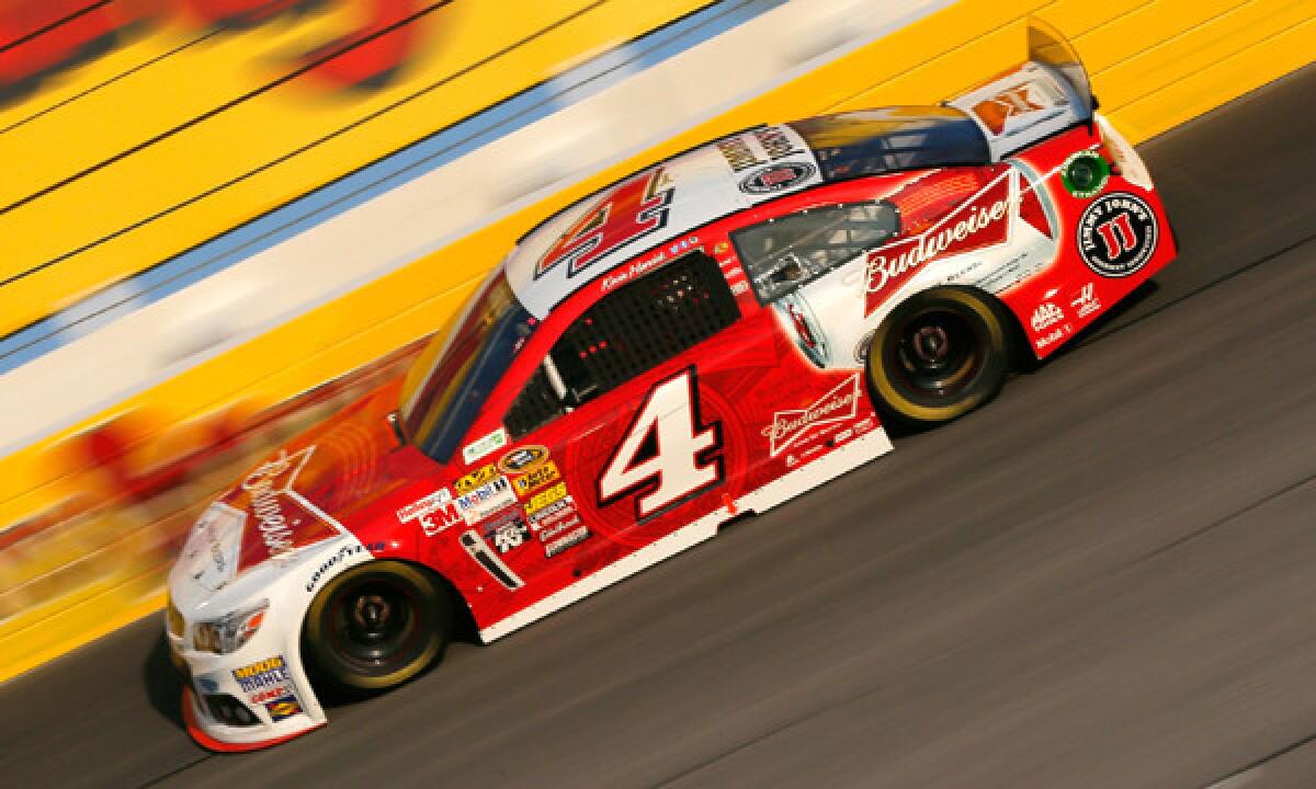 Kevin Harvick drives to victory in Saturday night's NASCAR Sprint Cup race at Darlington Raceway.