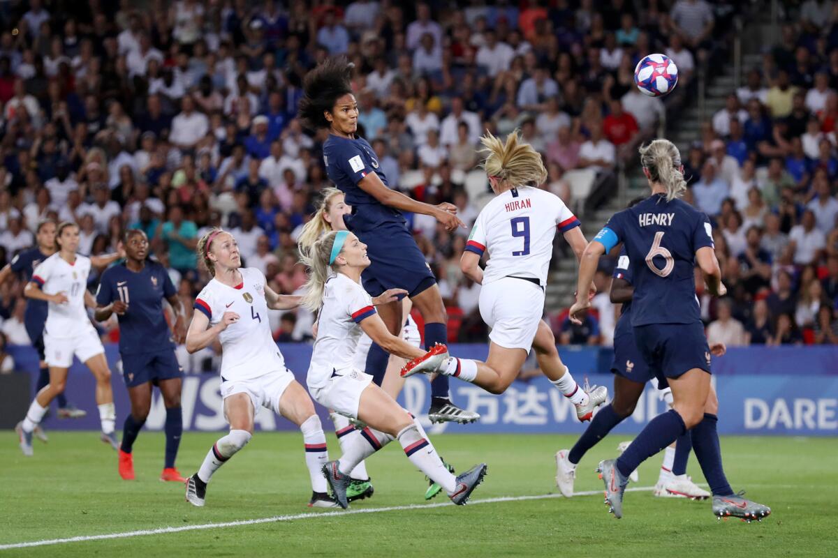 Wendie Renard of France scores her team's first goal.