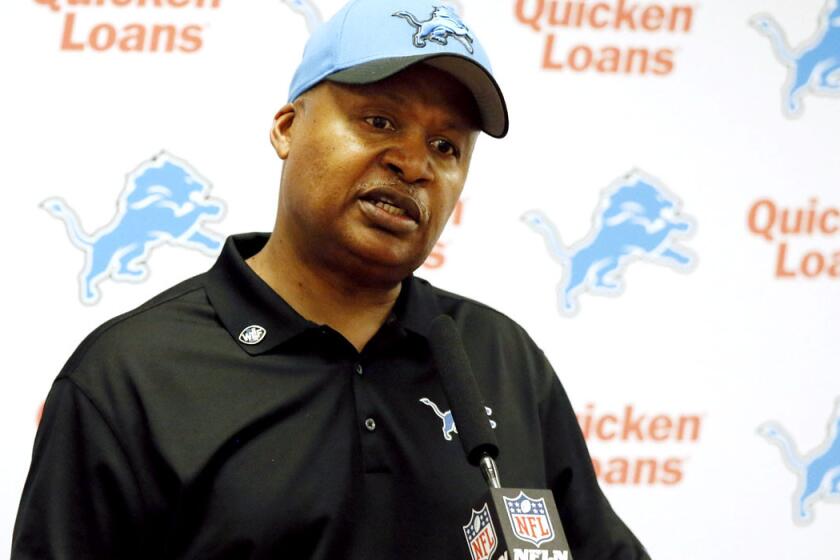 Lion Coach Jim Caldwell addresses reporters during a news conference on Sunday in Arlington, Texas.