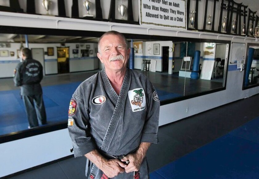 Bob White, owner of Bob White's Karate Studio in Costa Mesa, is leaving for Chile to help the nonprofit Royal Family Kids, which helps children who have been abused, abandoned or neglected.