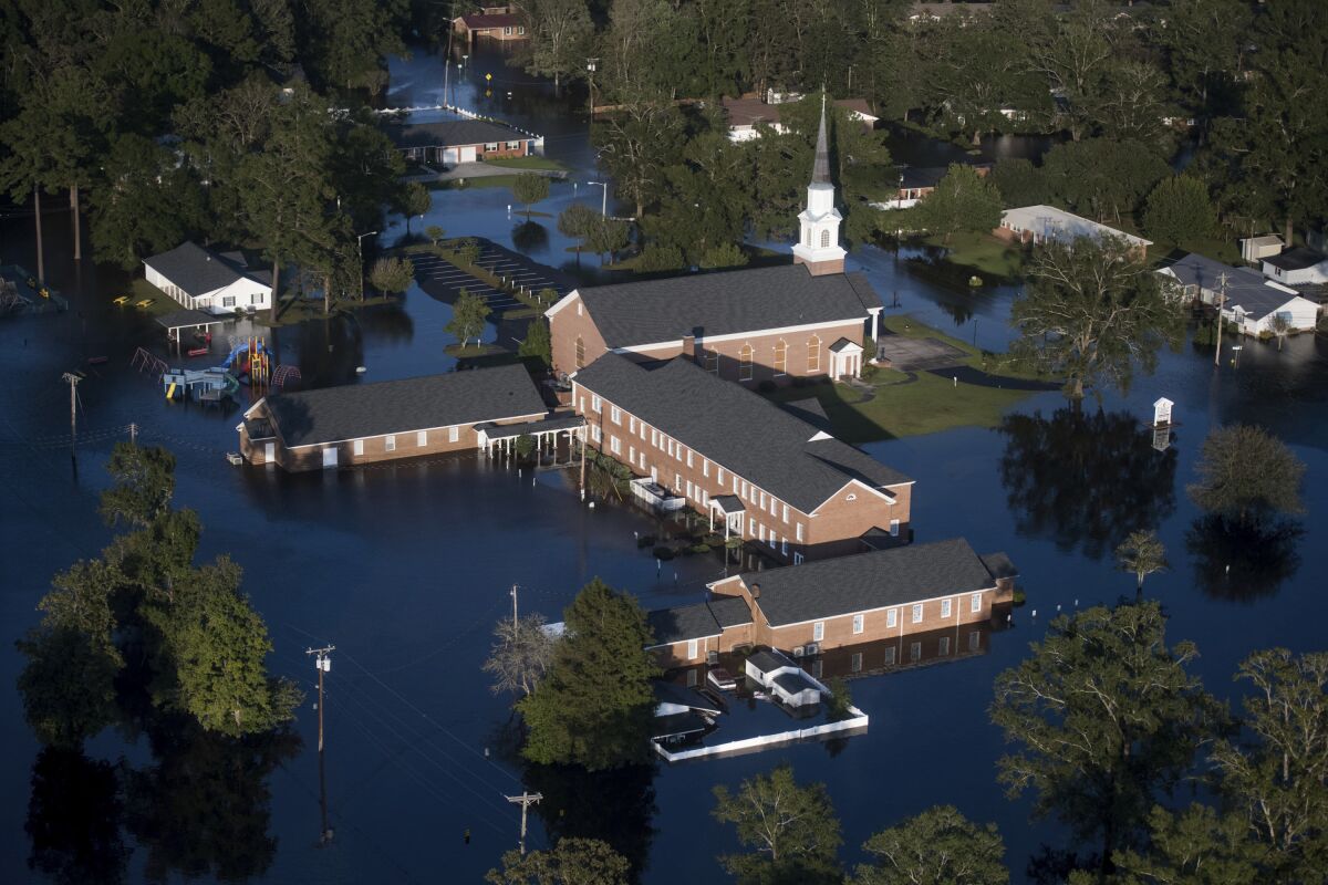 An aerial view shows standing water around a South Carolina church.