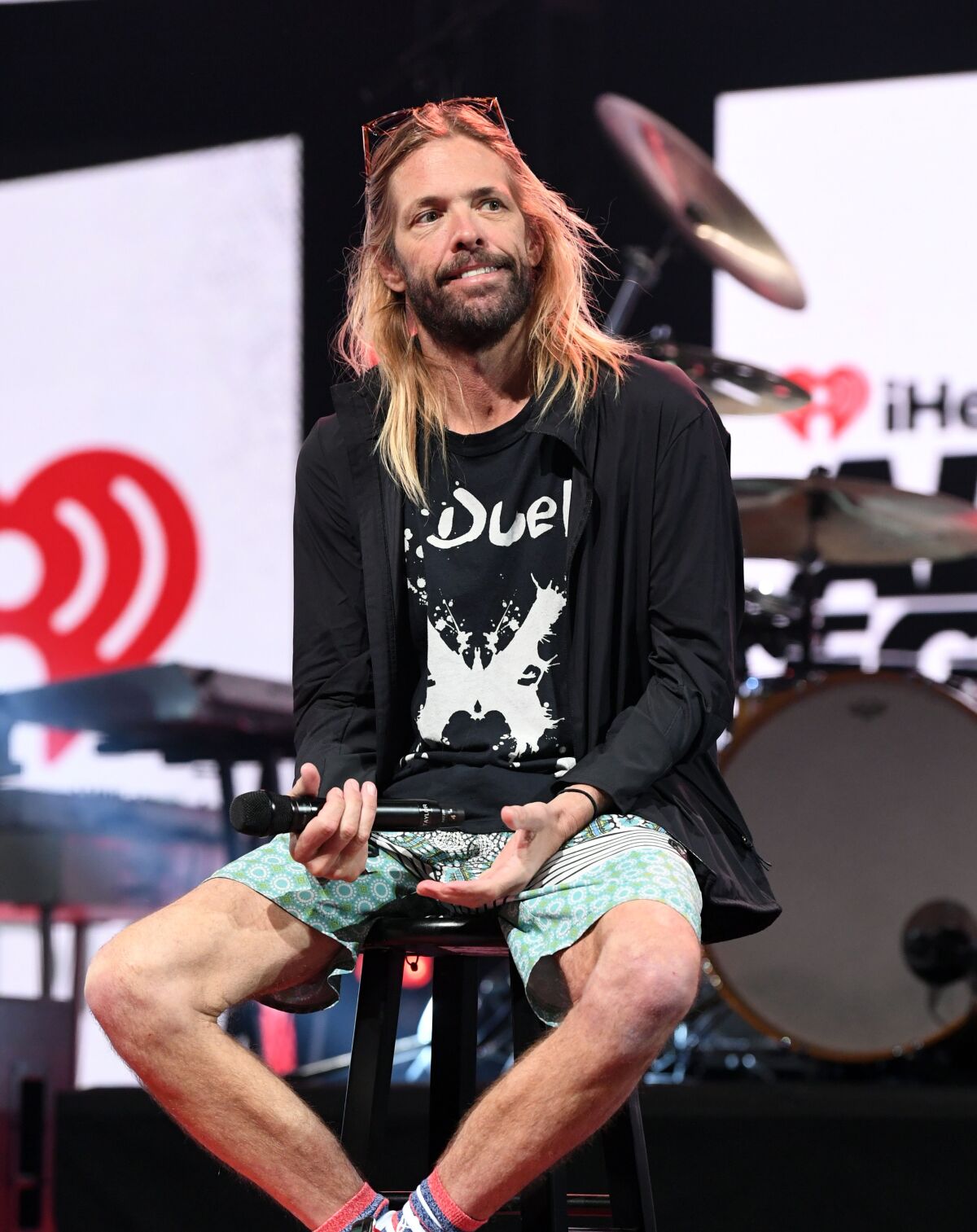 Taylor Hawkins of Foo Fighters sits onstage during an interview