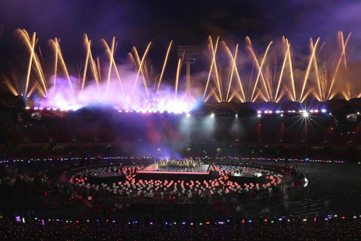 FILE - Fireworks light up at Carrara Stadium during the closing ceremony of the 2018 Commonwealth Games on the Gold Coast, Australia, on April 15, 2018. The Australian state of Victoria has been confirmed as the host of the 2026 Commonwealth Games. It will be the first-ever predominantly regional Commonwealth Games with events to be staged in several cities including Melbourne, Geelong, Bendigo, Ballarat and Gippsland. Australia has hosted five other times. The opening ceremony will be at the Melbourne Cricket Ground. (AP Photo/Mark Schiefelbein, File)