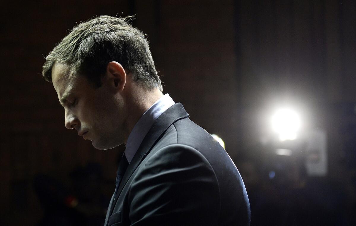 South African Olympian Oscar Pistorius appears at a court hearing in Pretoria last year.