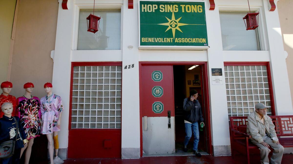 Two men were stabbed to death at the Hop Sing Tong.