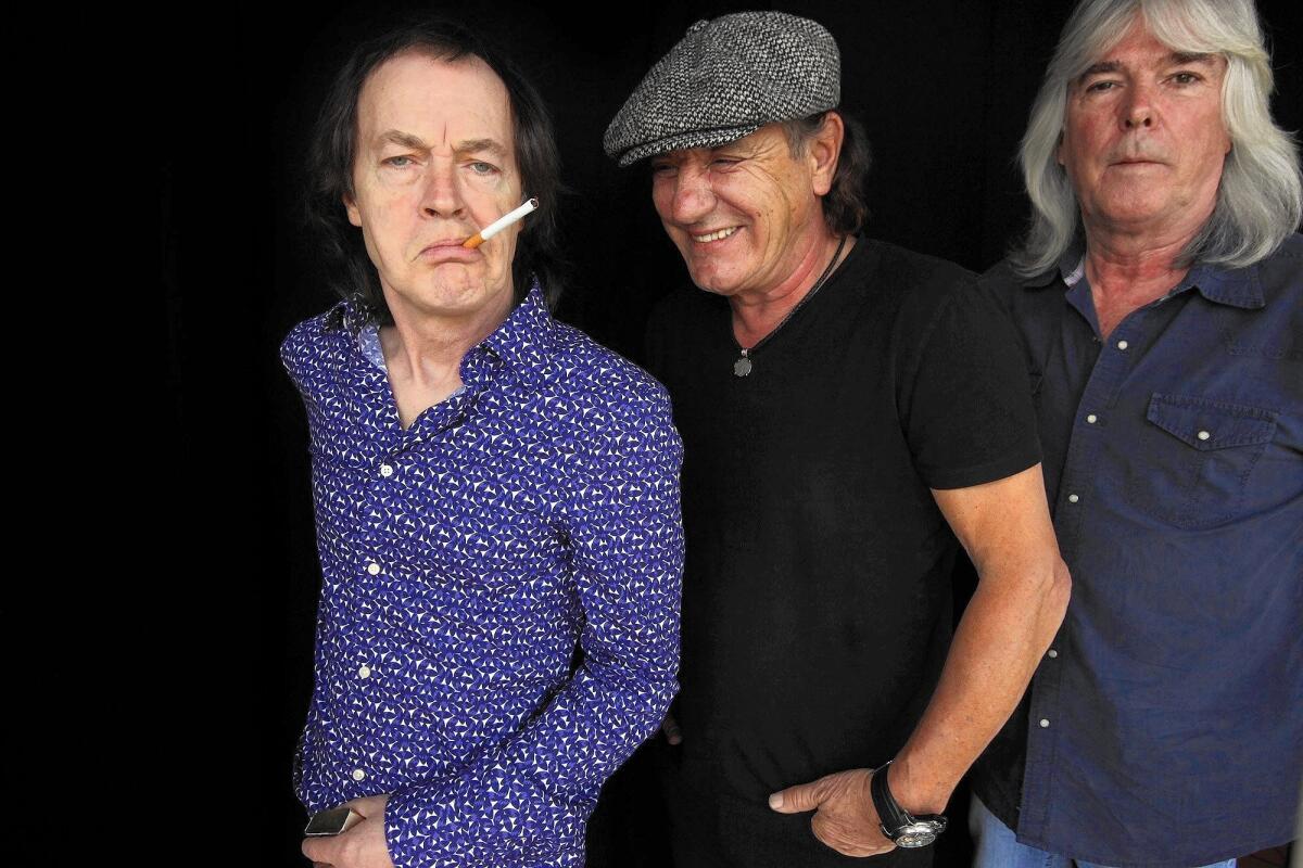 AC/DC guitarist Angus Young, from left, singer Brian Johnson and bassist Cliff Williams will headline at Coachella on Friday.