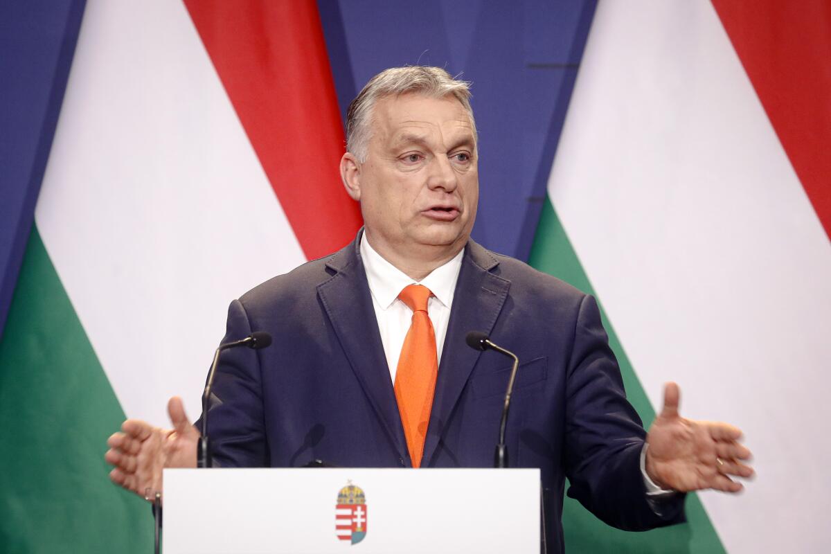 FILE - In this Thursday, April 1, 2021 file photo, Hungarian prime minister Viktor Orban, speaks during a joint press conference in Budapest, Hungary. Fidesz, the ruling party of Prime Minister Viktor Orban, tabled amendments in Parliament on Thursday, June 12 to new legislation that bans showing to people under 18 pornographic materials or any content encouraging gender change or homosexuality. The party describes the new legislation as part of an effort to protect children from pedophilia. But LGBT rights activists denounced the bills as discriminatory, with some comparing it to a 2013 Russian law banning so-called gay “propaganda.” (AP Photo/Laszlo Balogh, file)