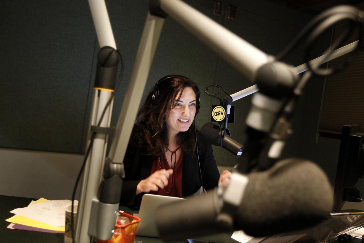 SANTA MONICA-CA-JANUARY 22, 2014: Madeleine Brand, host of Press Play, works in her studio at KCRW in Santa Monica on Wednesday, January 22, 2014. (Christina House / For The Times)