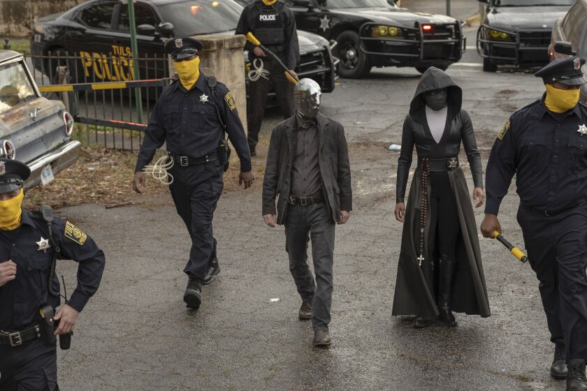 Tim Blake Nelson and Regina King in "Watchmen" on HBO. photo: Mark Hill/HBO.