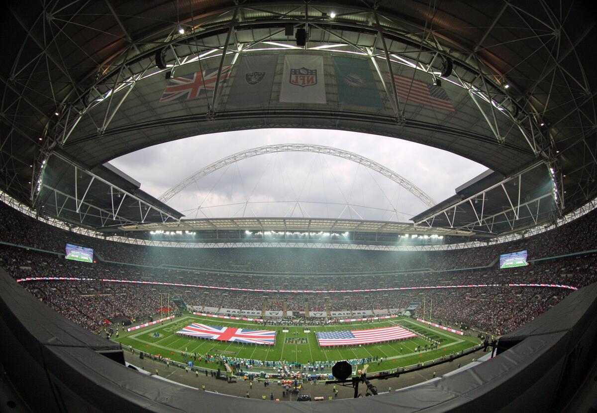 The national anthems are played at Wembley Stadium prior to kickoff for the NFL game between the Oakland Raiders and the Miami Dolphins last month in London.
