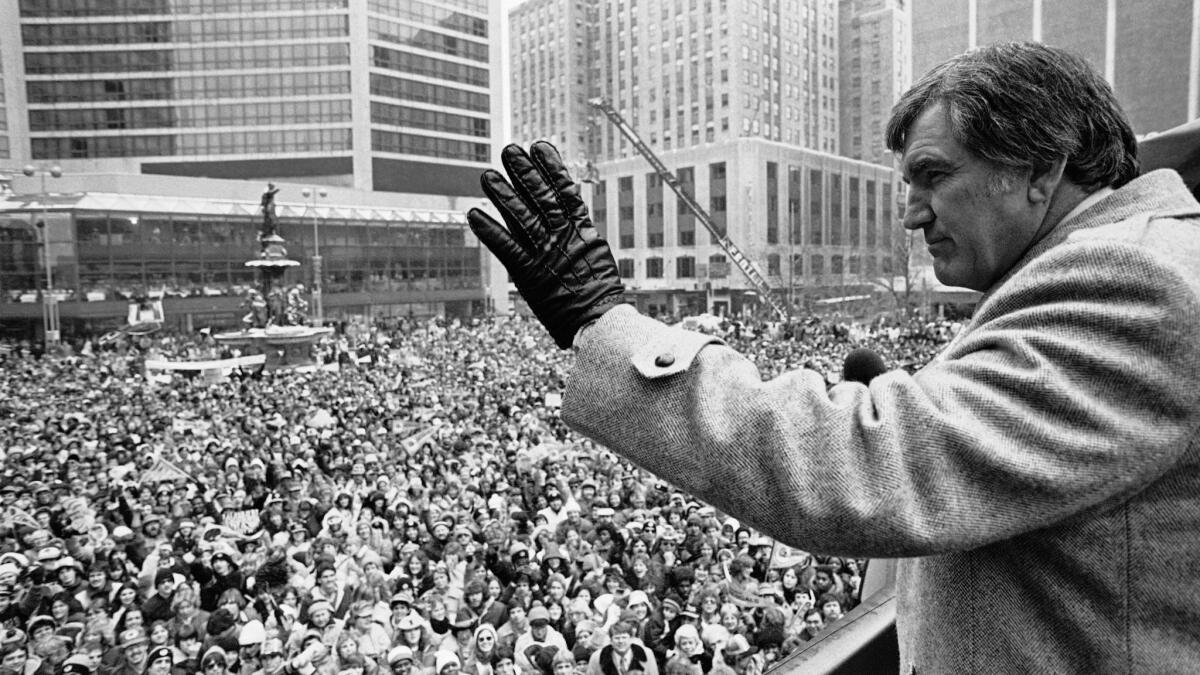 Forrest Gregg waves to the crowd in Cincinnati, where he coached following his career with the Packers.