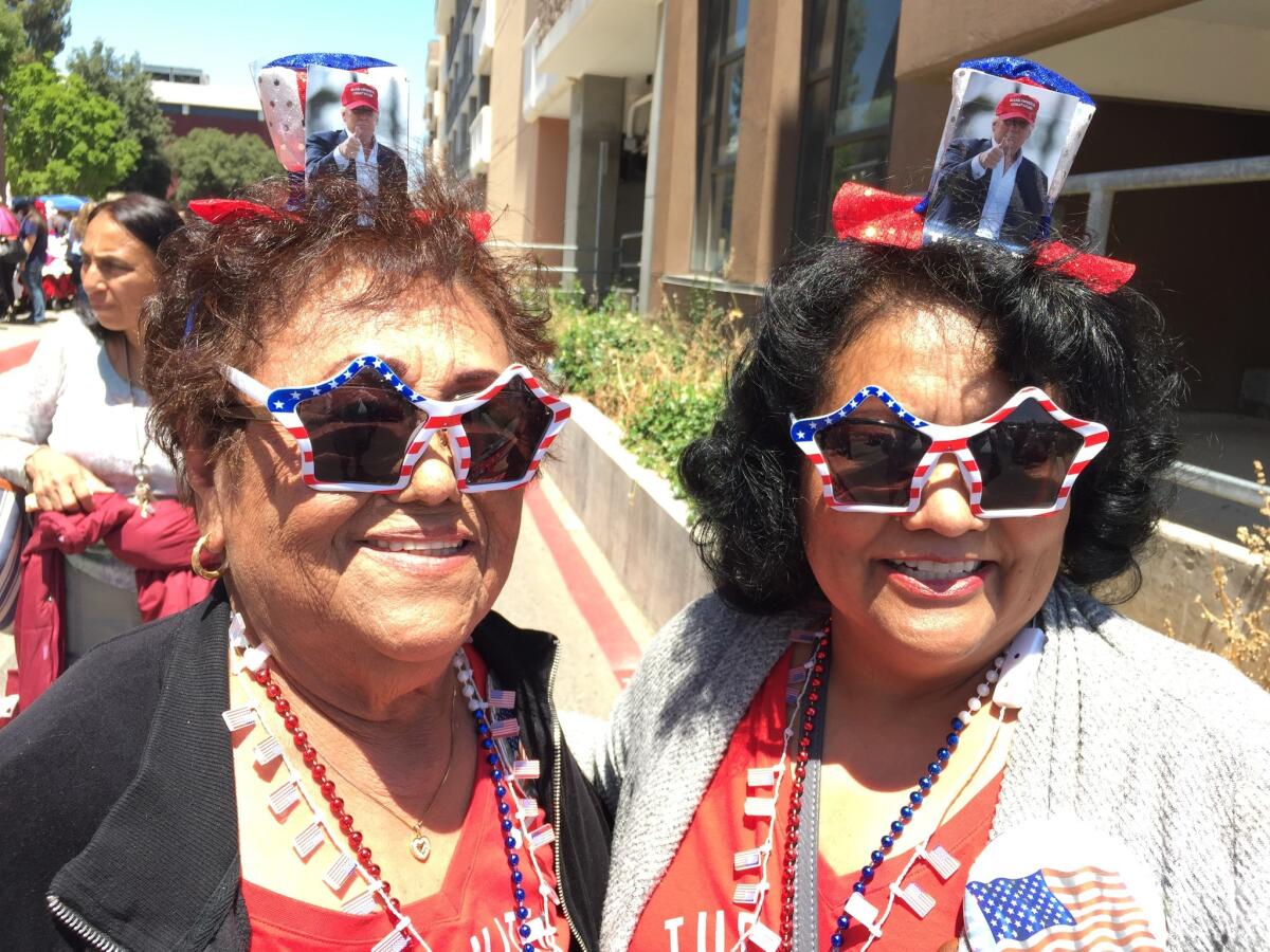 Elena Pineda, 81, and her daughter Mary Jennings, 57, attend a rally for Republican presumptive presidential nominee Donald Trump in Fresno on Friday. Some of Jennings' family have stopped speaking to her over her support for Trump.