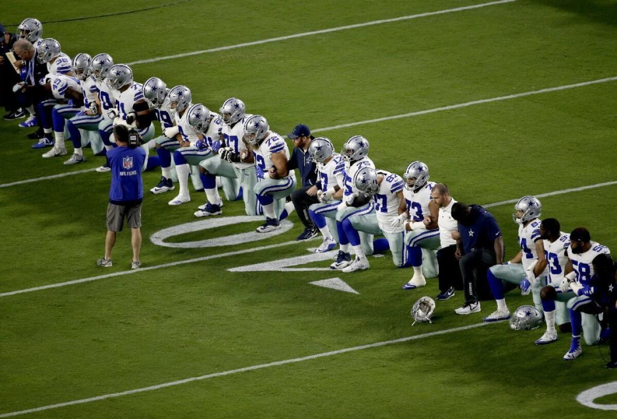Members of the Dallas Cowboys, including owner Jerry Jones, took a knee during the national anthem before a Monday Night Football game against the Arizona Cardinals.