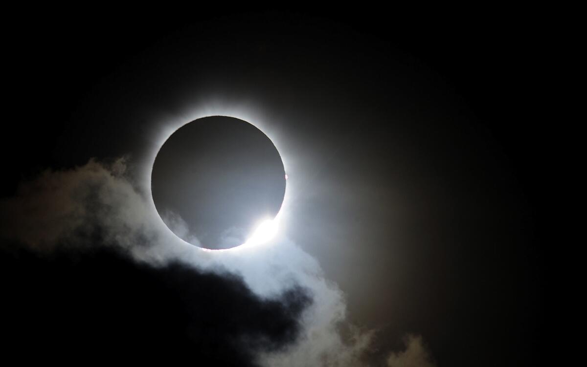 Near totality is seen during the solar eclipse in Palm Cove, Australia, on Nov. 14, 2012. (Ian Hitchcock / Getty Images)