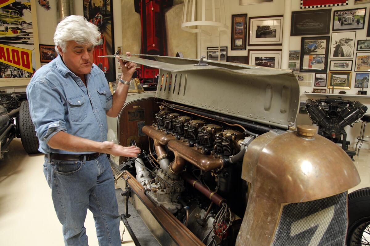 Leno shows off the 22-liter, inline six-cylinder airplane engine in his 1917 Fiat Botafogo Special.