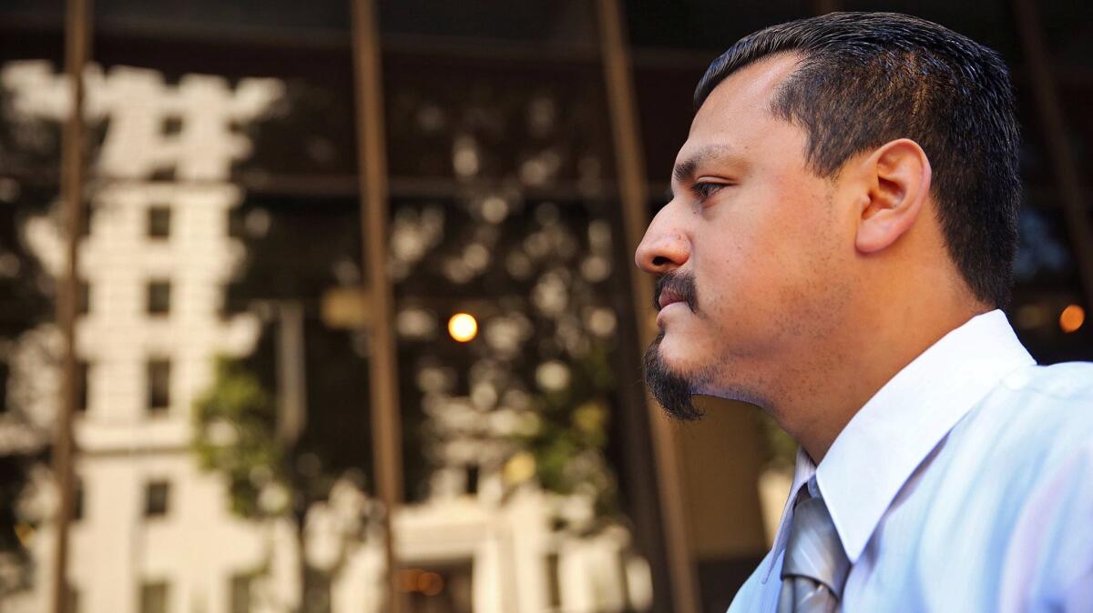 A former Los Angeles County sheriff's deputy was sentenced Monday to nine months of home detention and 640 hours of community service for lying to federal investigators about the beating of Gabriel Carrillo, above, a jail visitor.
