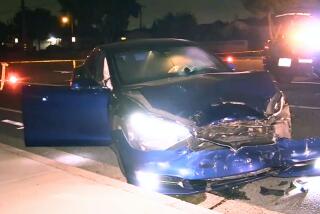 A driver in a Tesla car crashed into a police cruiser in Orange County