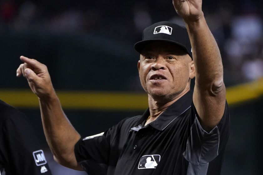 MLB umpire Kerwin Danley (44) in the first inning during a baseball game between the Arizona Diamondbacks and the San Diego Padres, Monday, Sept. 2, 2019, in Phoenix. (AP Photo/Rick Scuteri)