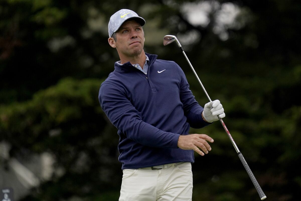 Paul Casey watches his tee shot on the 11th hole during the third round of the PGA Championship golf tournament at TPC Harding Park Saturday, Aug. 8, 2020, in San Francisco. (AP Photo/Jeff Chiu)