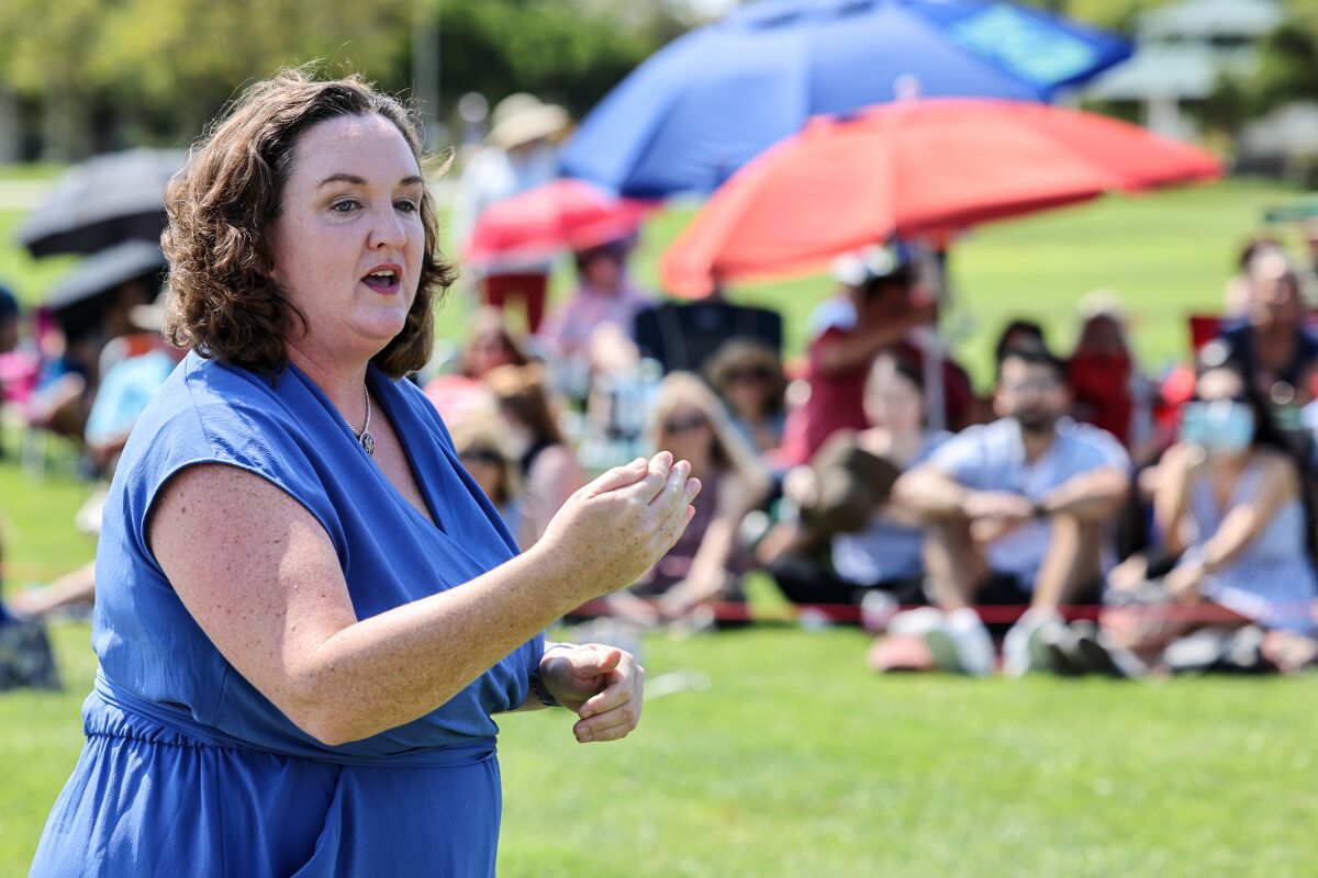 Rep Katie Porter addresses constituents at an outdoor town hall meeting in Irvine on July 11.