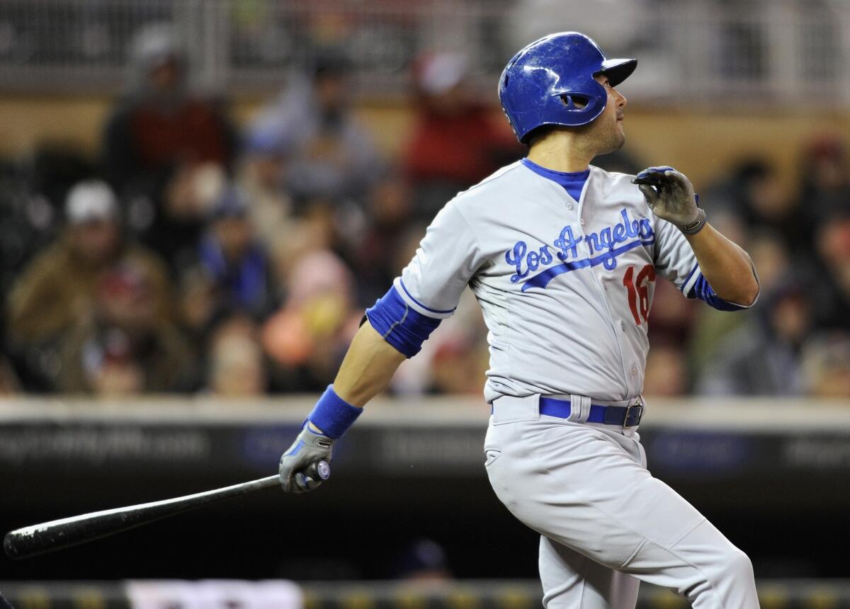 Dodgers outfielder Andre Ethier follows through on a run-scoring double against the Twins last week.