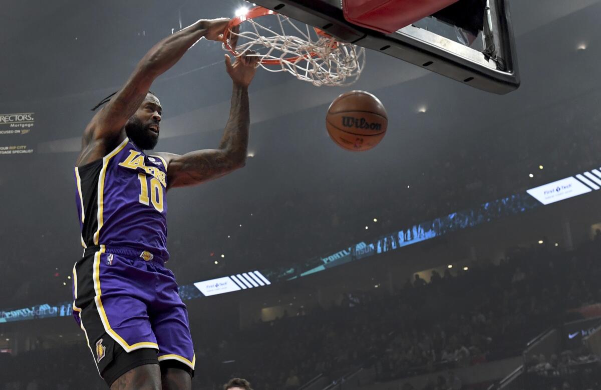 Lakers center DeAndre Jordan dunks during the first half Nov. 6, 2021. 