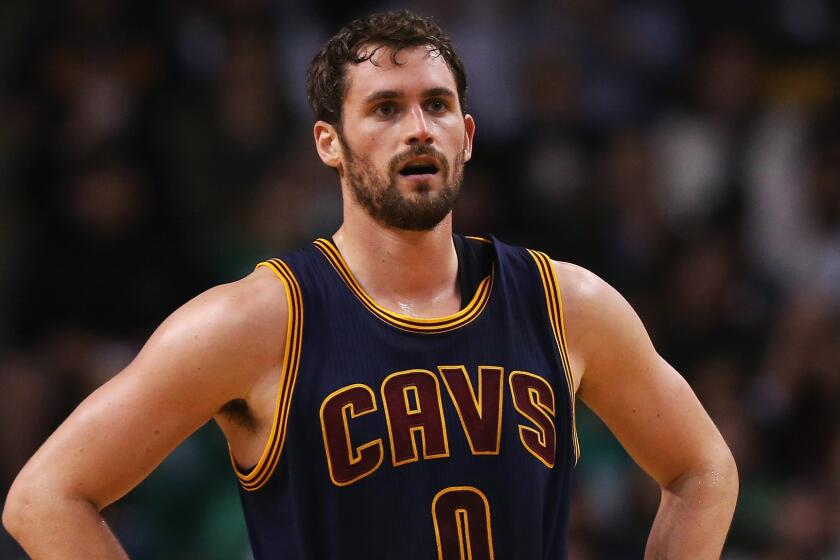 Cleveland Cavaliers forward Kevin Love looks on during a playoff game against the Boston Celtics on April 23.
