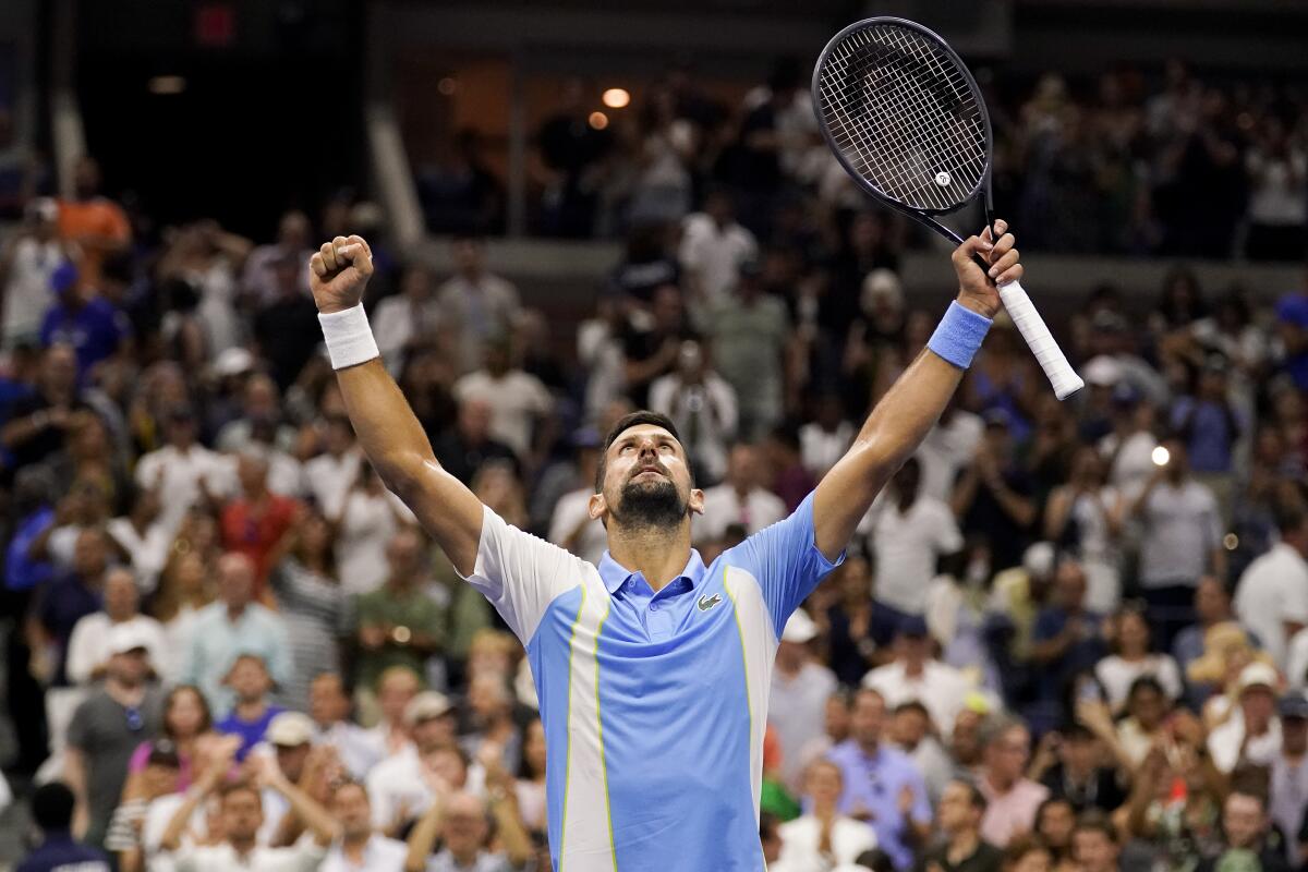Novak Djokovic celebrates after defeating Ben Shelton in the U.S. Open semifinals on Friday.