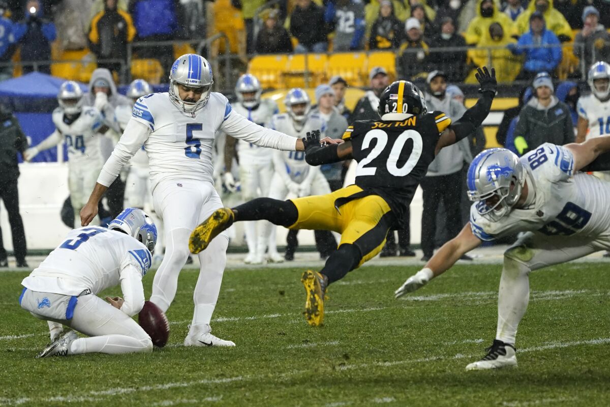 Detroit Lions kicker Zane Gonzalez (5) misses a field goal-attempt during the overtime period of an NFL football game against the Pittsburgh Steelers, Sunday, Nov. 14, 2021, in Pittsburgh. (AP Photo/Keith Srakocic)