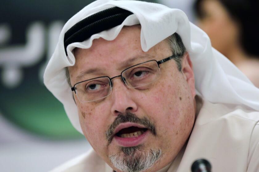 FILE - In this Feb. 1, 2015 file photo, Saudi journalist Jamal Khashoggi speaks during a news conference in Manama, Bahrain. Saudi Arabia is moving ahead with plans to hold a glitzy investment forum that kicks off Tuesday, Oct. 23, 2018, despite some of its most important speakers pulling out in the global outcry over the killing of Khashoggi. The meeting was intended to draw leading investors who could help underwrite Crown Prince Mohammed bin Salmans ambitious plans to revamp the economy. (AP Photo/Hasan Jamali, File)