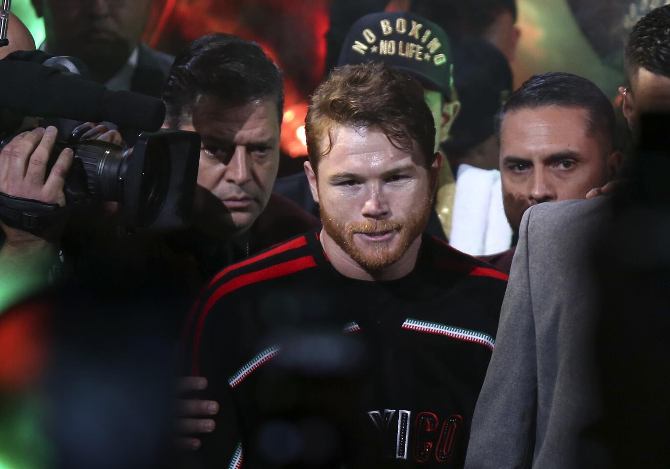 Canelo Alvarez enters T-Mobile arena for a middleweight title boxing match against Gennady Golovkin, Saturday, Sept. 15, 2018, in Las Vegas.