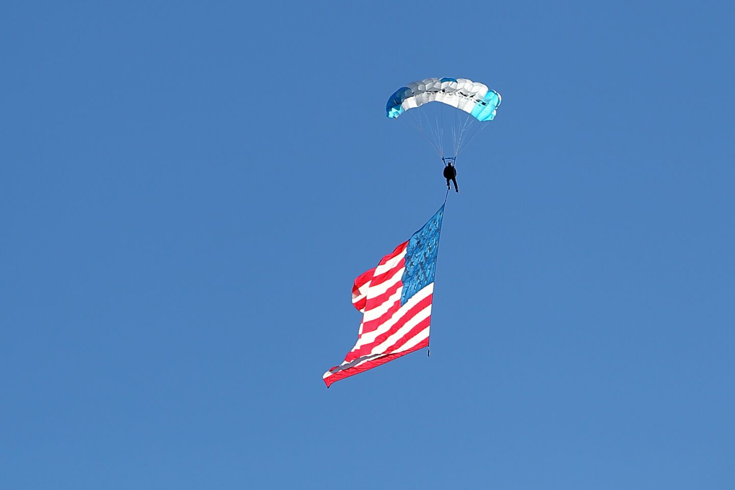 Skydivers float in to the annual Mitchell Thorpe Foundation 5K Run/Walk at Poinsettia Community Park in Carlsbad
